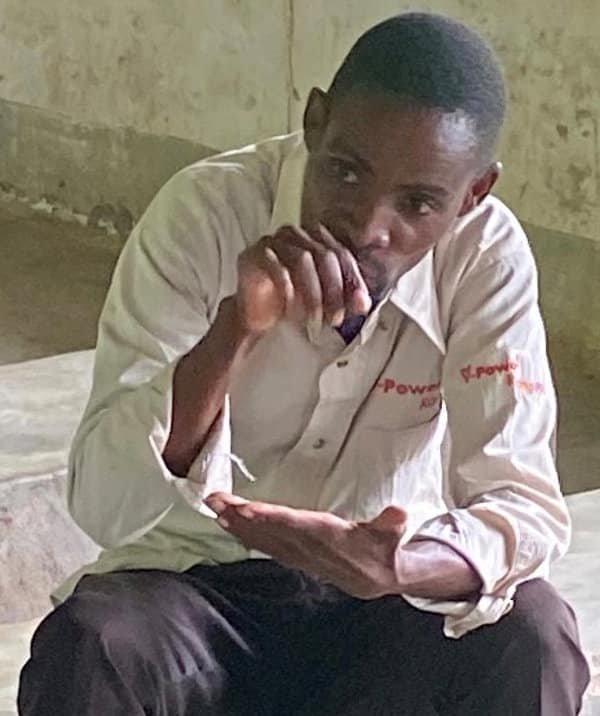 Davie Banda, who supervises the Academy, emphasising a point.